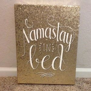 Namaste in bed sign